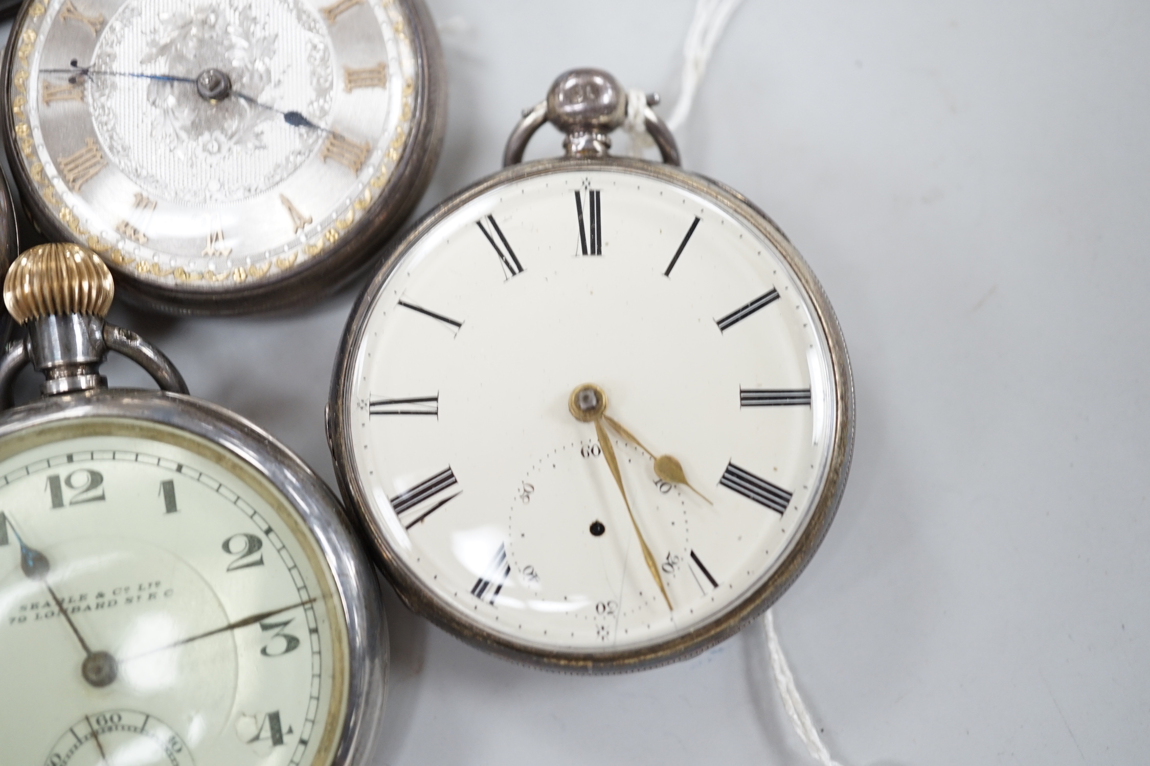 Twelve assorted silver or base metal pocket watches including chrome Omega, Searle & Co and gold plated hunter.